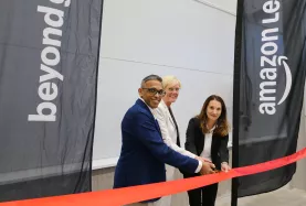 Ceremonial ribbon-cutting at the new hall in Linköping: Sam Dabare, Head of Supply Chain & Vice President, Amazon Leo Manufacturing, with Barbara Frei-Spreiter, CEO Beyond Gravity, and Ulrika Unell, Vice President Separation Systems at Beyond Gravity. © Beyond Gravity, Henrik Wielander